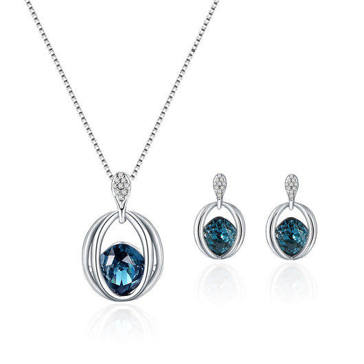 Silver-tone necklace and drop earrings set with blue cushion-cut crystals and clear accents, ideal for bridal wear. - Image 2