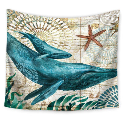 Blue whale and calf tapestry with a starfish, seaweed, and vintage map background with mandala patterns.