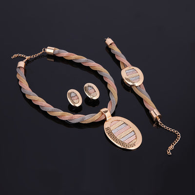 Four-piece jewelry set with tri-color braided necklace, earrings, bracelet, and ring. Each piece features an oval design with a Greek key border and striped gol - Image 4