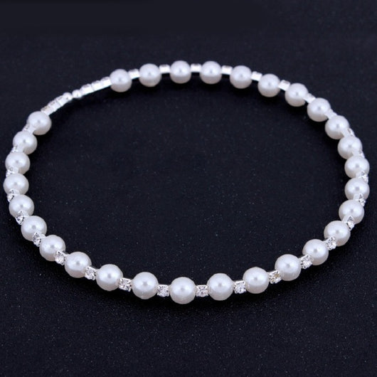 Bridal three-piece jewelry set with white pearls and clear rhinestones, including a necklace, bracelet, and square stud earrings. - Image 3