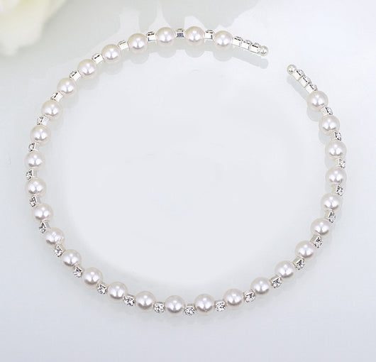 Bridal three-piece jewelry set with white pearls and clear rhinestones, including a necklace, bracelet, and square stud earrings. - Image 6