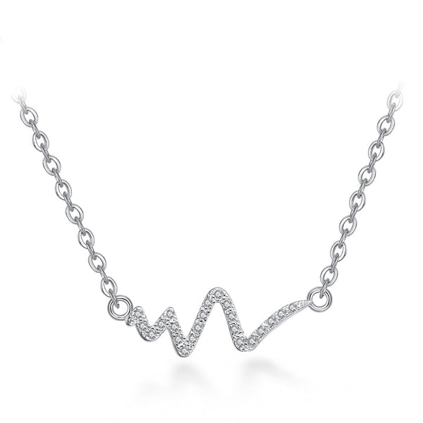 Silver necklace with an ECG heartbeat line pendant, adorned with small clear stones on a simple link chain.