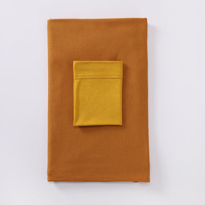 Black minimalist modal bottom hat integrated scarf, folded neatly on a white background. - Image 16