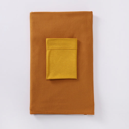 Black minimalist modal bottom hat integrated scarf, folded neatly on a white background. - Image 16