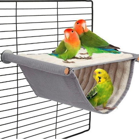 Gray and cream two-tier pet hammock with plush interior, hanging in a wire cage with three small birds. - Image 4
