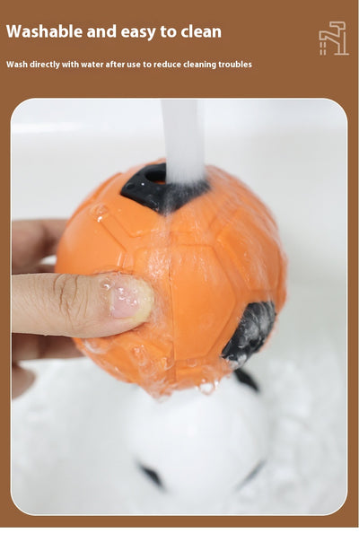 White and black dog toy with a soccer ball base and a textured rod for nibbling and teeth grinding. - Image 15