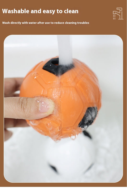 White and black dog toy with a soccer ball base and a textured rod for nibbling and teeth grinding. - Image 15