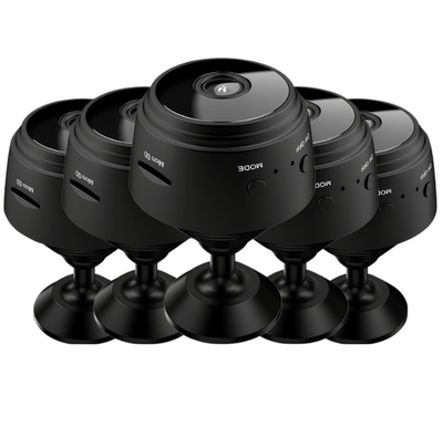 White A9 WIFI wireless network camera with a black lens, shown next to a black 32GB microSD card. - Image 22