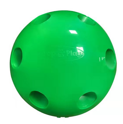 A cute tabby and white kitten with green eyes playing with a bright green dome-shaped interactive cat toy. - Image 3