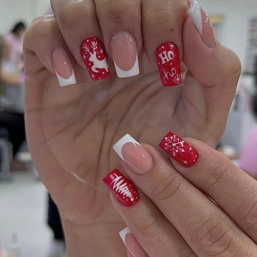 Manicura Navideña Roja con Copos de Nieve y Renos