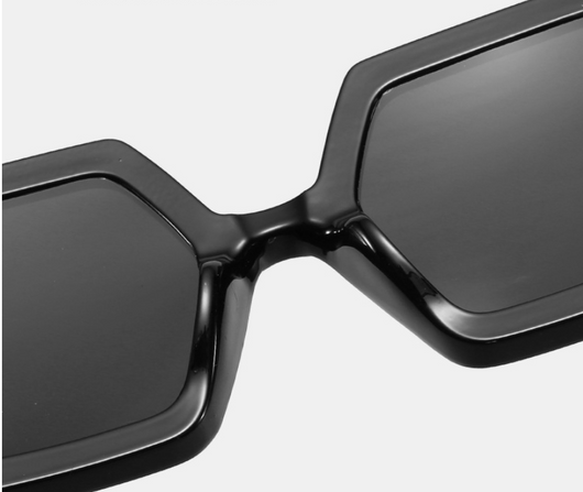 Octagonal sunglasses with brown gradient lenses and a tortoiseshell chain strap on a white background. - Image 10