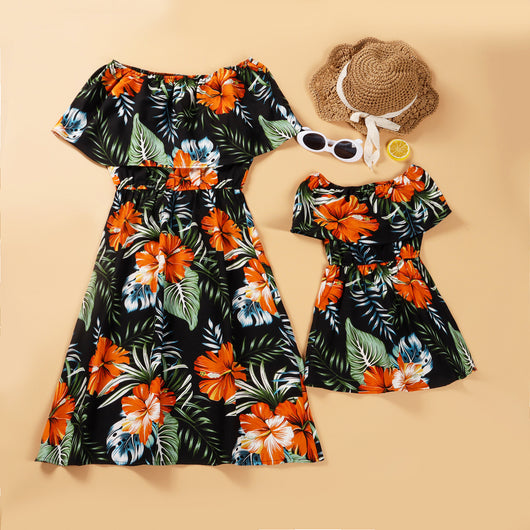 Family matching Hawaiian outfits: men's shirt and shorts, women's off-shoulder maxi dress, girl's dress, boy's shirt and shorts, all with black, orange hibiscus - Image 17