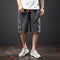 Pantalones Capri Elásticos Bordados con Múltiples Bolsillos
