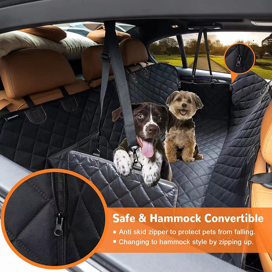 Black quilted pet car seat cover with adjustable straps and side flaps, shown with water droplets on the fabric. - Image 9