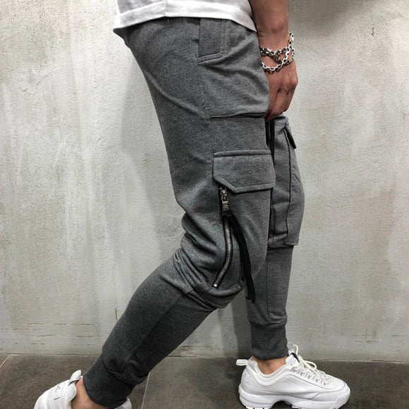 Pantalones deportivos slim fit con bolsillos de cierre