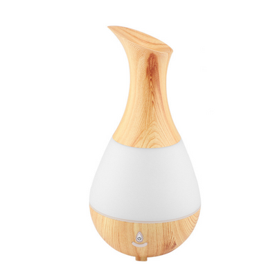 White teardrop-shaped aromatherapy humidifier with a curved neck and a power button, featuring a translucent middle section. - Image 5