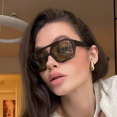 Minimalist square fashion sunglasses with a tortoiseshell frame and light brown lenses, angled view. - Image 14