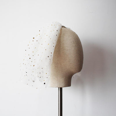 White multi-layer short bridal veil with gold star embellishments, worn by a model in a white lace wedding dress. - Image 7