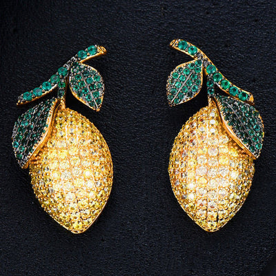 Aretes de Circonita Forma Mango en Oro Cepillado - Image 4