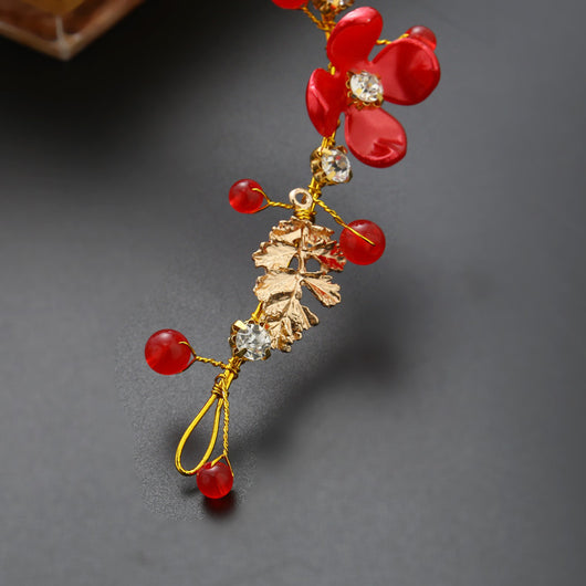 Red floral wedding costume jewelry set with a headdress, three hairpins, and two dangle earrings. - Image 4
