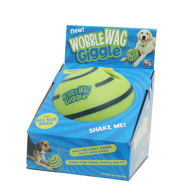 Wobble Wag Giggle dog sound ball, white with green stripes, in blue packaging highlighting glow-in-the-dark feature. - Image 5