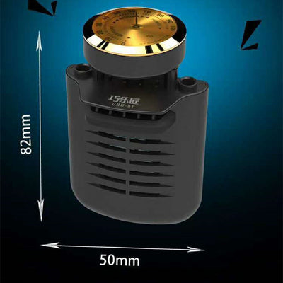 Black guitar humidifier with a gold hygrometer dial, shown with water splashes against a blue background and a guitar soundhole. - Image 7