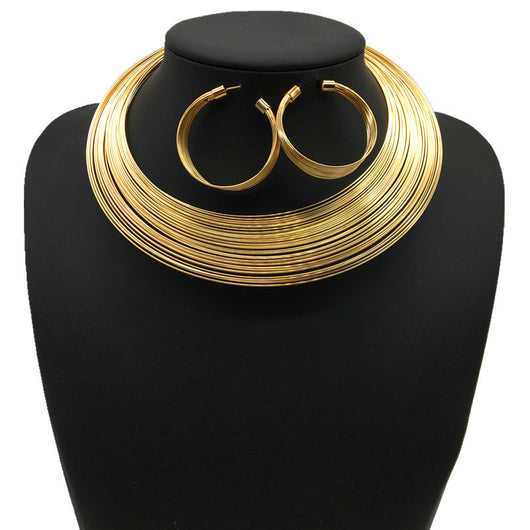Silver-tone multi-strand choker necklace, hoop earrings, cuff bracelet, and ring set on a black mannequin. - Image 2