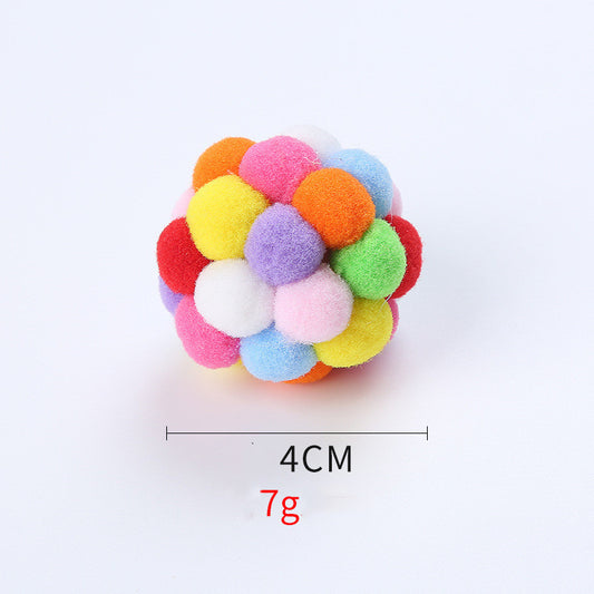 Red and green plush pom-pom ball cat toy, 4cm in diameter, for playful cats.