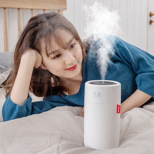 White cylindrical USB rechargeable wireless ultrasonic aromatherapy water mist diffuser lamp with H₂O HUMIDIFIER text. - Image 3