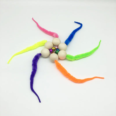Wooden bead cat toy with a golden bell and a neon yellow fuzzy worm-like attachment on a white background. - Image 8