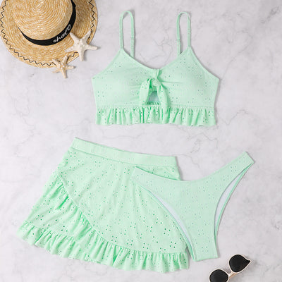 Light blue eyelet two-piece swimsuit set with a tie-front crop top and a matching ruffle-trim hip-hugging skirt. - Image 12