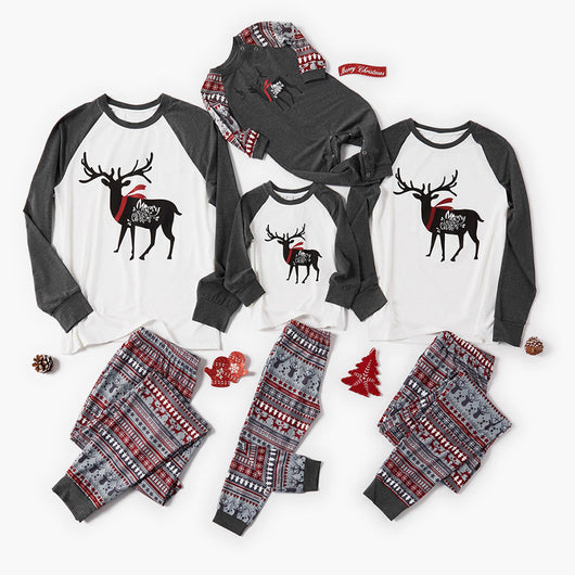 Family matching Christmas pajamas: black long-sleeve tops with white deer prints and red buffalo plaid pants. - Image 16
