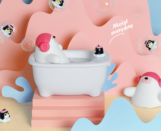 Creative air humidifier shaped like a white bathtub with a polar bear wearing pink earmuffs and a small penguin. - Image 4