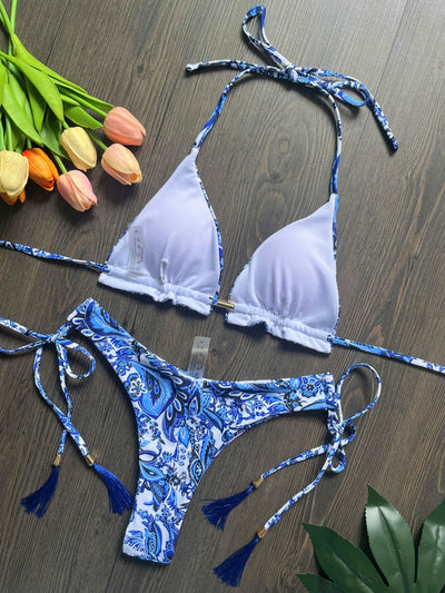 Women's blue and white porcelain print halter bikini with tie-side bottoms and blue tassels. - Image 29