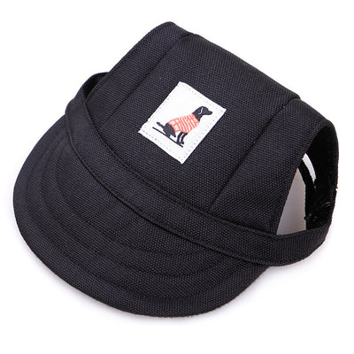 Orange pet baseball cap with ear holes and a curved brim, featuring a small patch with a dog graphic. - Image 2