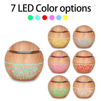 Dark wood grain mini ultrasonic humidifier with a mushroom shape and decorative hollow-out pattern. - Image 16