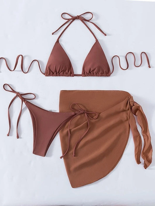 Neon yellow three-piece bikini set with triangle cup lace-up top, tie-side bottom, and matching sarong, displayed with a straw hat and sunglasses. - Image 13