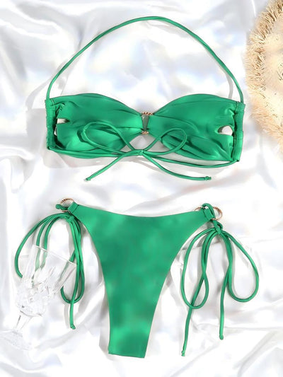 Women's brown lace-up halter bikini suit with ruched top and gold-tone ring details, modeled outdoors. - Image 19