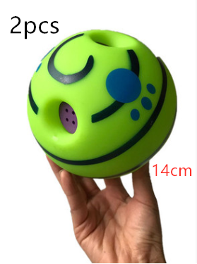 Wobble Wag Giggle dog sound ball, white with green stripes, in blue packaging highlighting glow-in-the-dark feature. - Image 4
