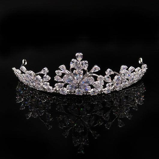Sparkling bridal jewelry set with a silver-tone crown, necklace, and teardrop earrings, adorned with clear crystals. - Image 2