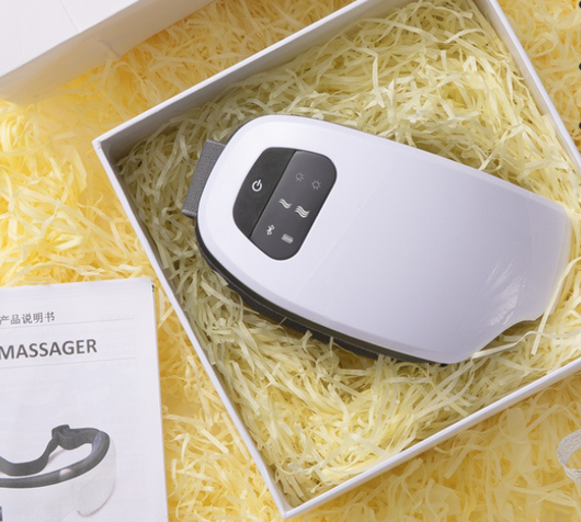 White Bluetooth music eye massager with control panel, air pressure, and hot compress functions in a gift box. - Image 14