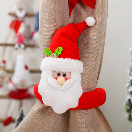 Plush Santa Claus curtain tie-back with a red and grey knitted hat, white beard, and red body, holding a golden curtain. - Image 6