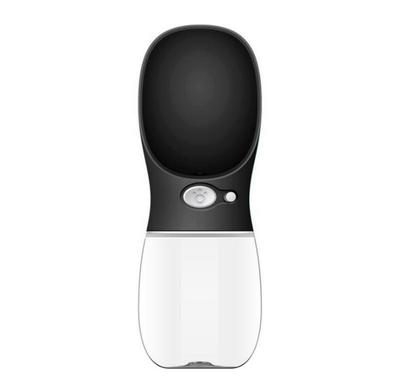 White portable pet water bottle with a clear reservoir and built-in drinking bowl, shown in a bag. - Image 18