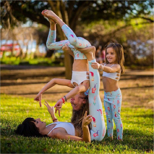 Parent-child dance fitness yoga suit with black tank tops and vibrant pink, orange, and green striped leggings. - Image 8