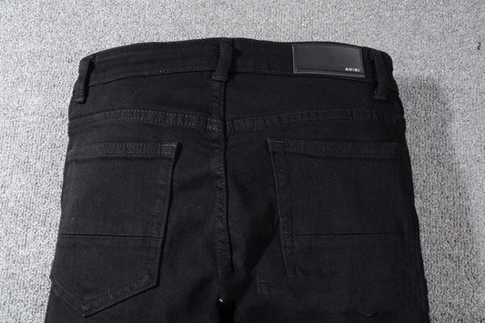 Jeans Negros con Detalles de Bigotes de Gato - Image 2