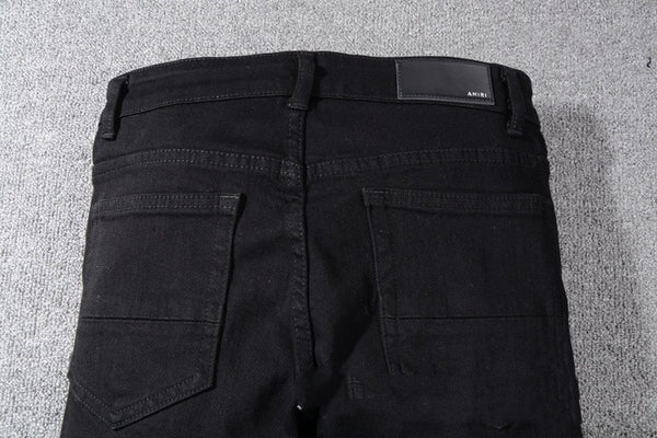 Jeans Negros con Detalles de Bigotes de Gato