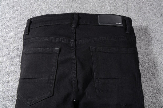 Jeans Negros con Detalles de Bigotes de Gato - Image 2