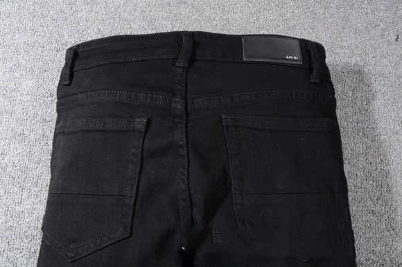 Jeans Negros con Detalles de Bigotes de Gato
