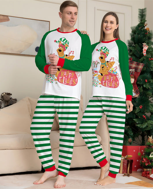 Woman wearing green and white striped holiday pajamas with a Scooby-Doo "Happy Holidays!" graphic on the top. - Image 2