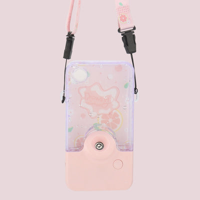 Pink and clear portable handheld humidifier with a fruit pattern, mist nozzle, and a matching pink neck lanyard. - Image 4